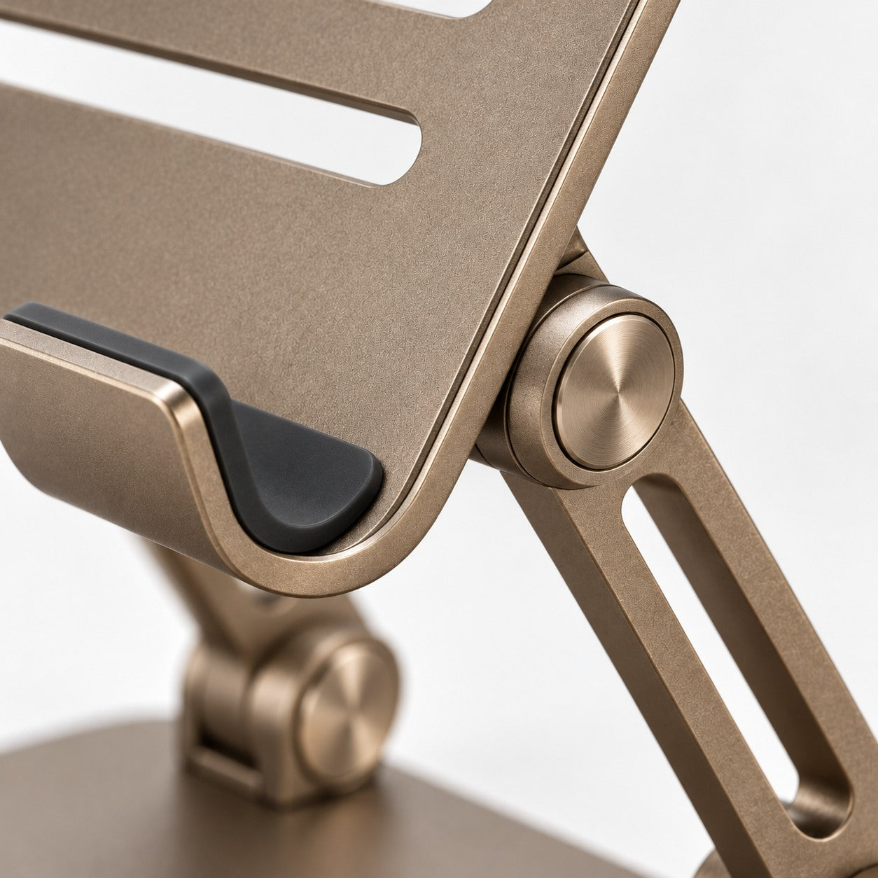 Bronze tablet stand hinge and silicone-lined support